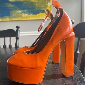 Orange, platform heels.